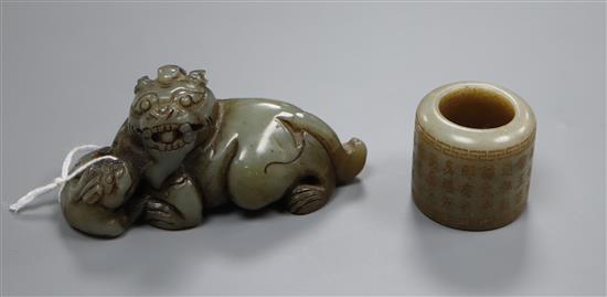 A jade carved lion-dog and an archers ring